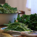 green leaves on white ceramic bowl