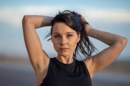 woman in black tank top