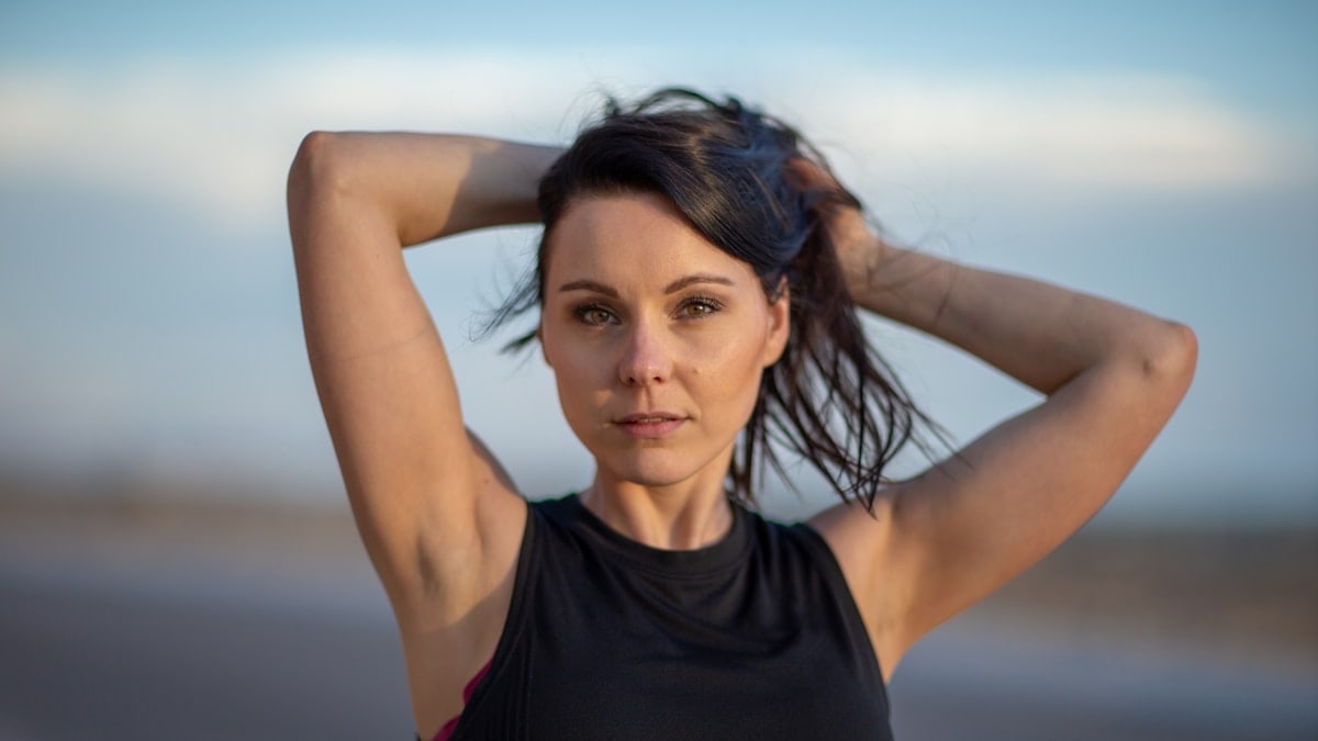 woman in black tank top